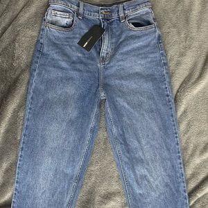 Selling fashion nova jeans mom jeans style size 9